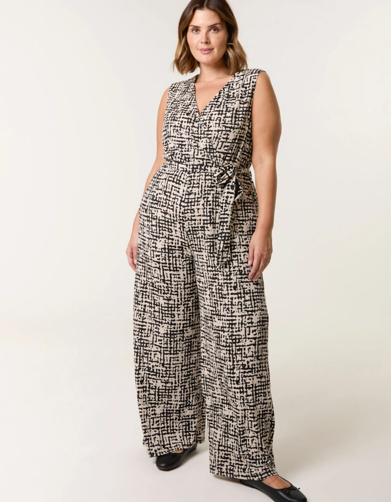 Multi Curve Sleeveless Belted Jumpsuit