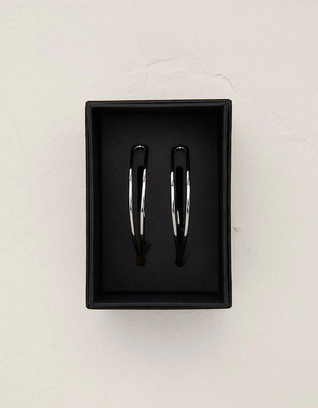 Silver Tone Criss Cross Hoop Earring