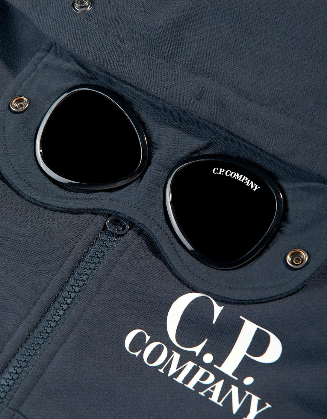 C.P. Company Boys Goggle Hooded Zip Up Top in Navy