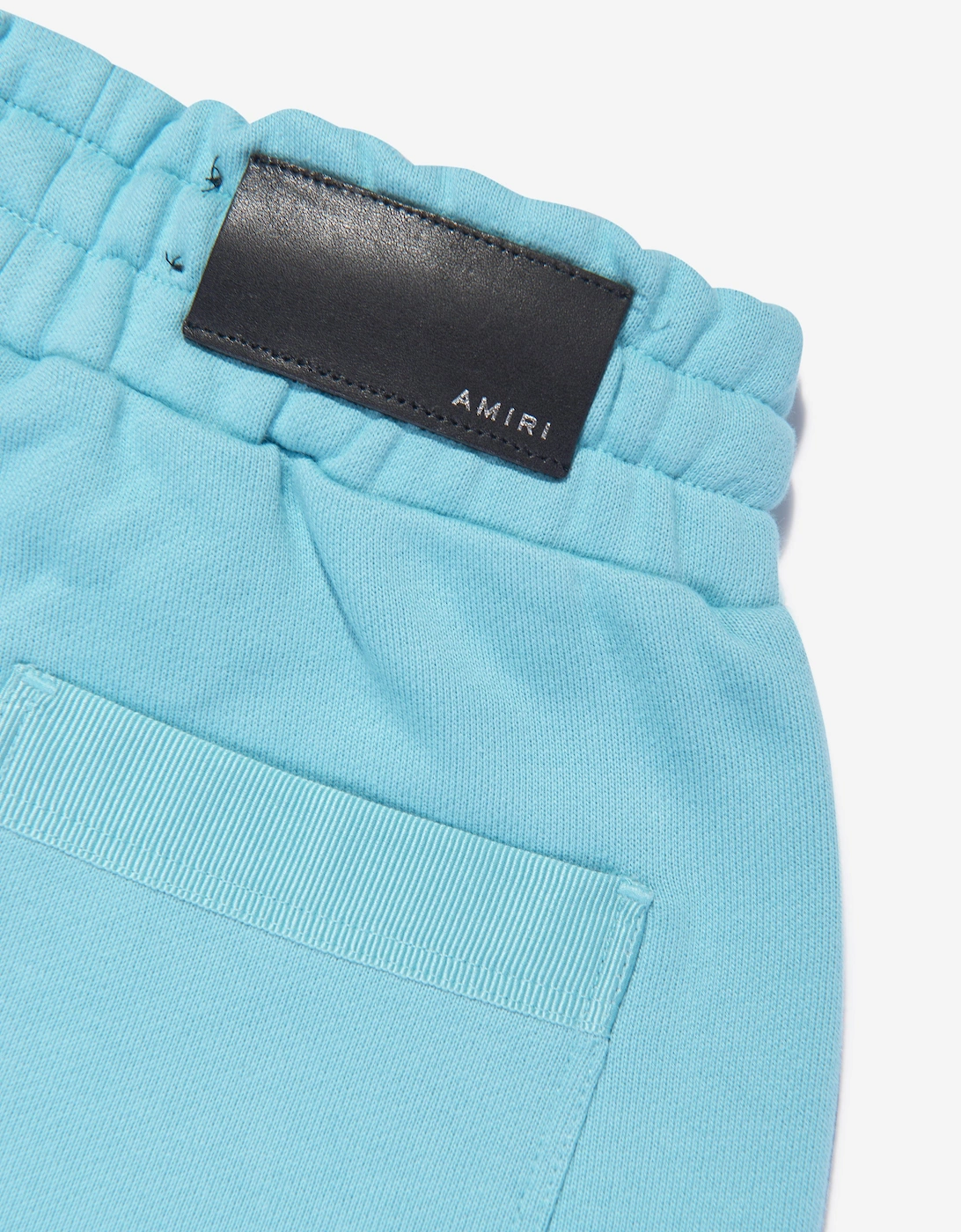 Kids Staggered Scribble Logo Joggers in Blue