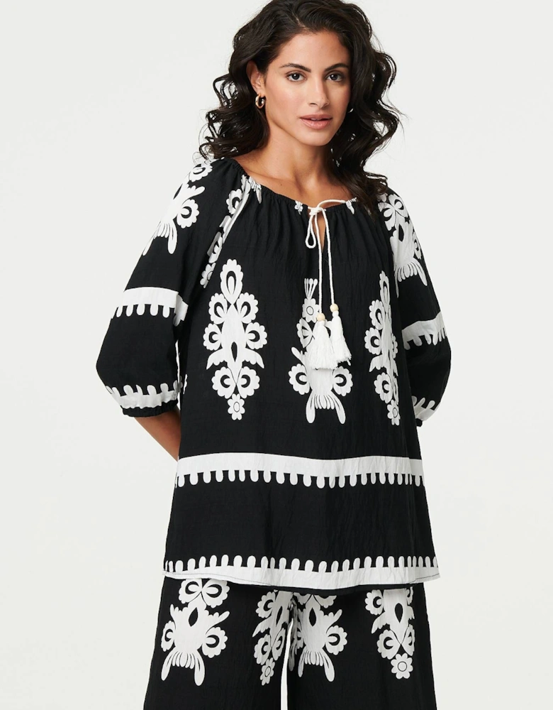 Ikat Print Tassel Tie Neck Blouse