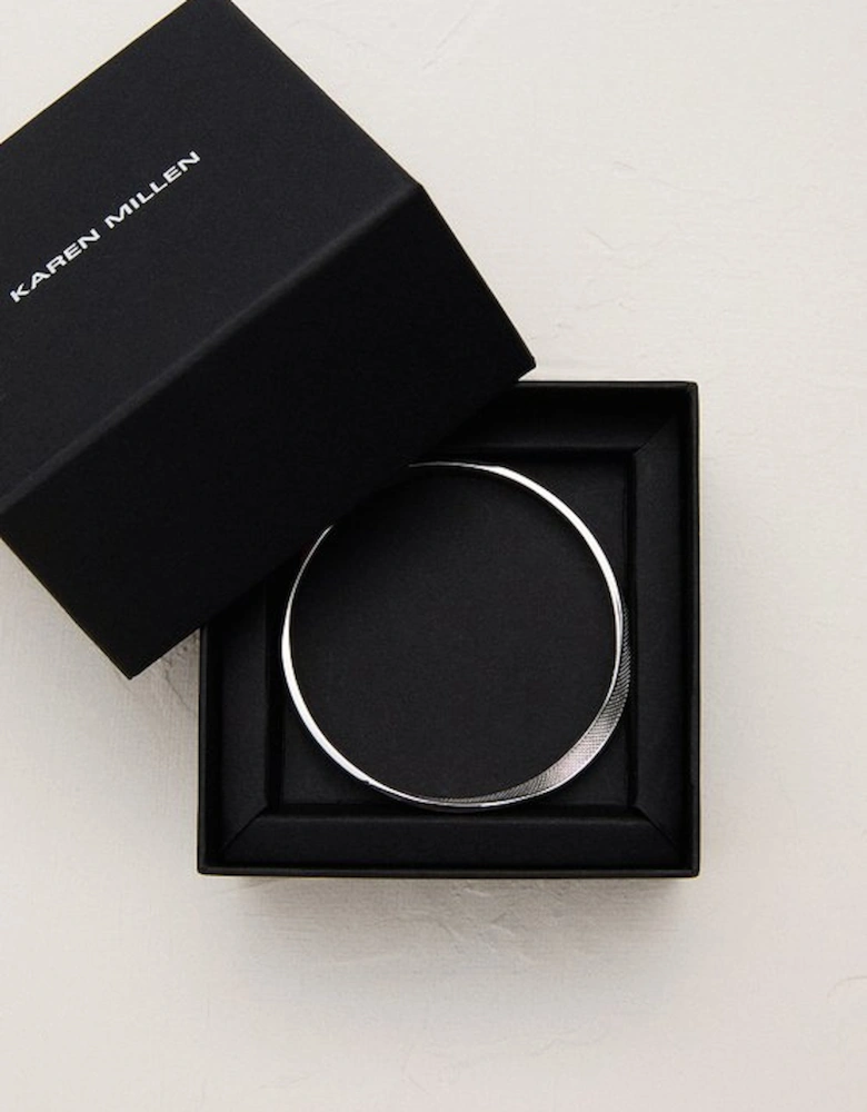 Silver Tone Textured Twist Narrow Bangle