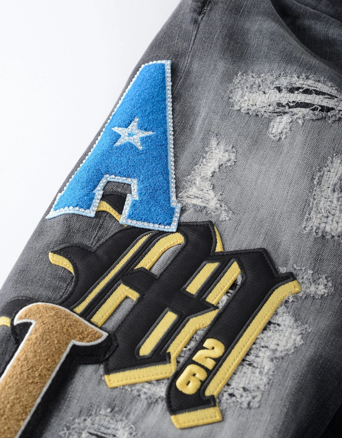 VARSITY PATCH SKINNY JEAN