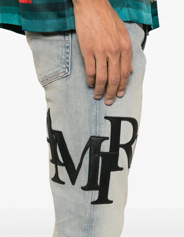 STAGGERED LOGO SKINNY JEAN