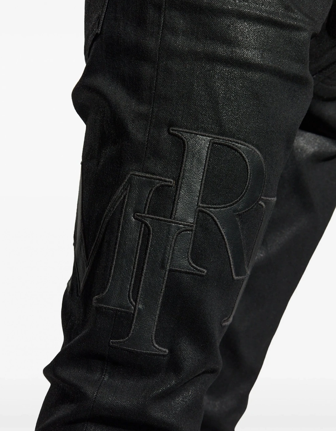 WAXED STAGGERED LOGO SKINNY JEAN