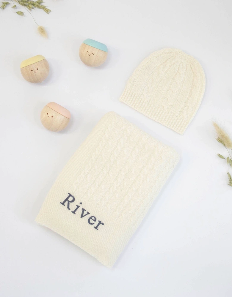 CABLE KNIT CASHMERE AND SENSORY BALLS - IVORY