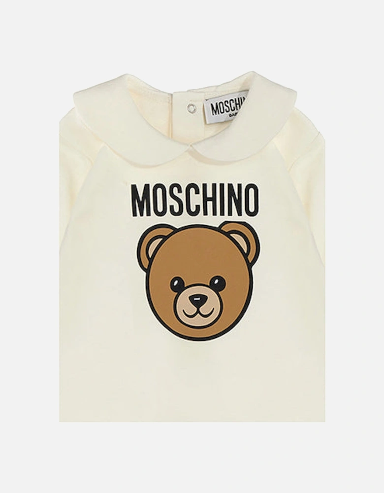 NEW BORN BEIGE BABY GROW MUY098