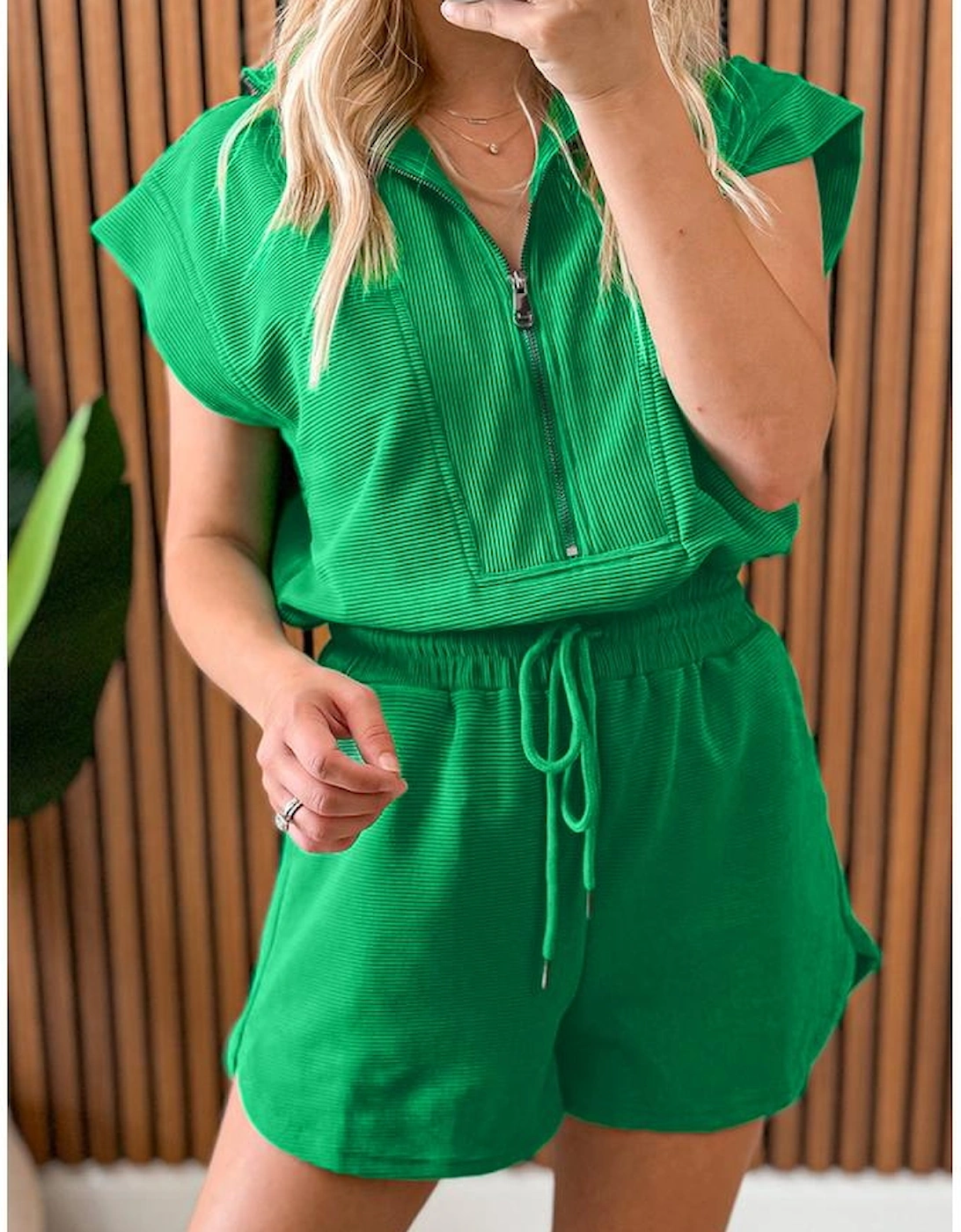 Bright Green Textured Short Sleeve Half Zip Drawstring Waist Romper
