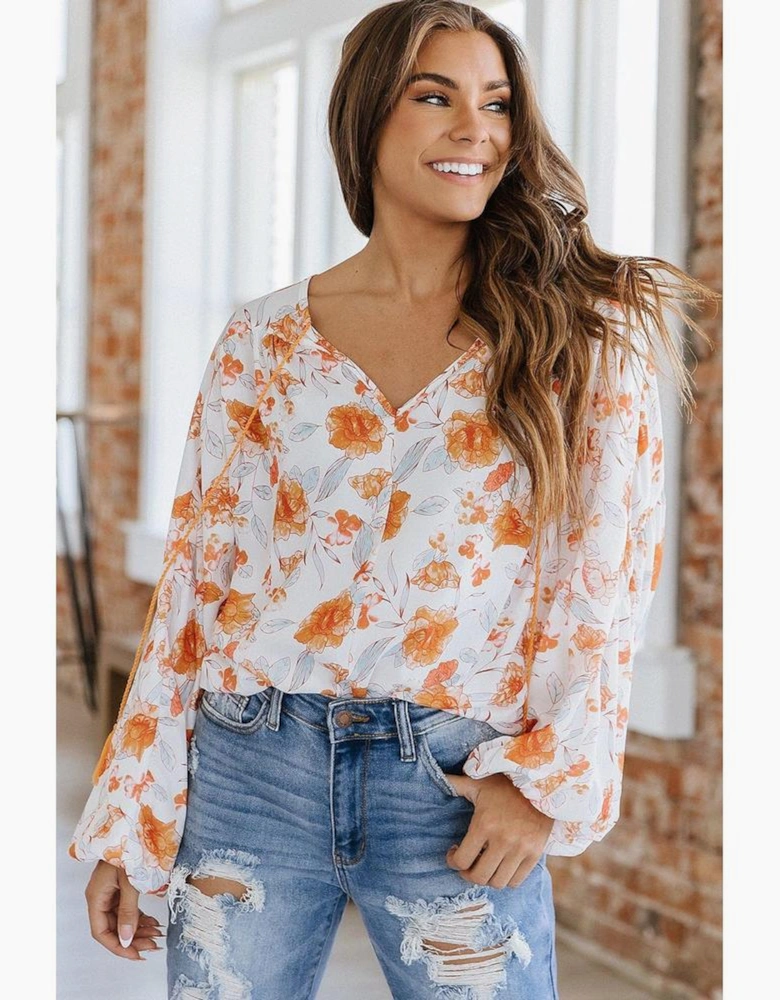 White Tassel Tie V Neck Bubble Sleeve Floral Blouse