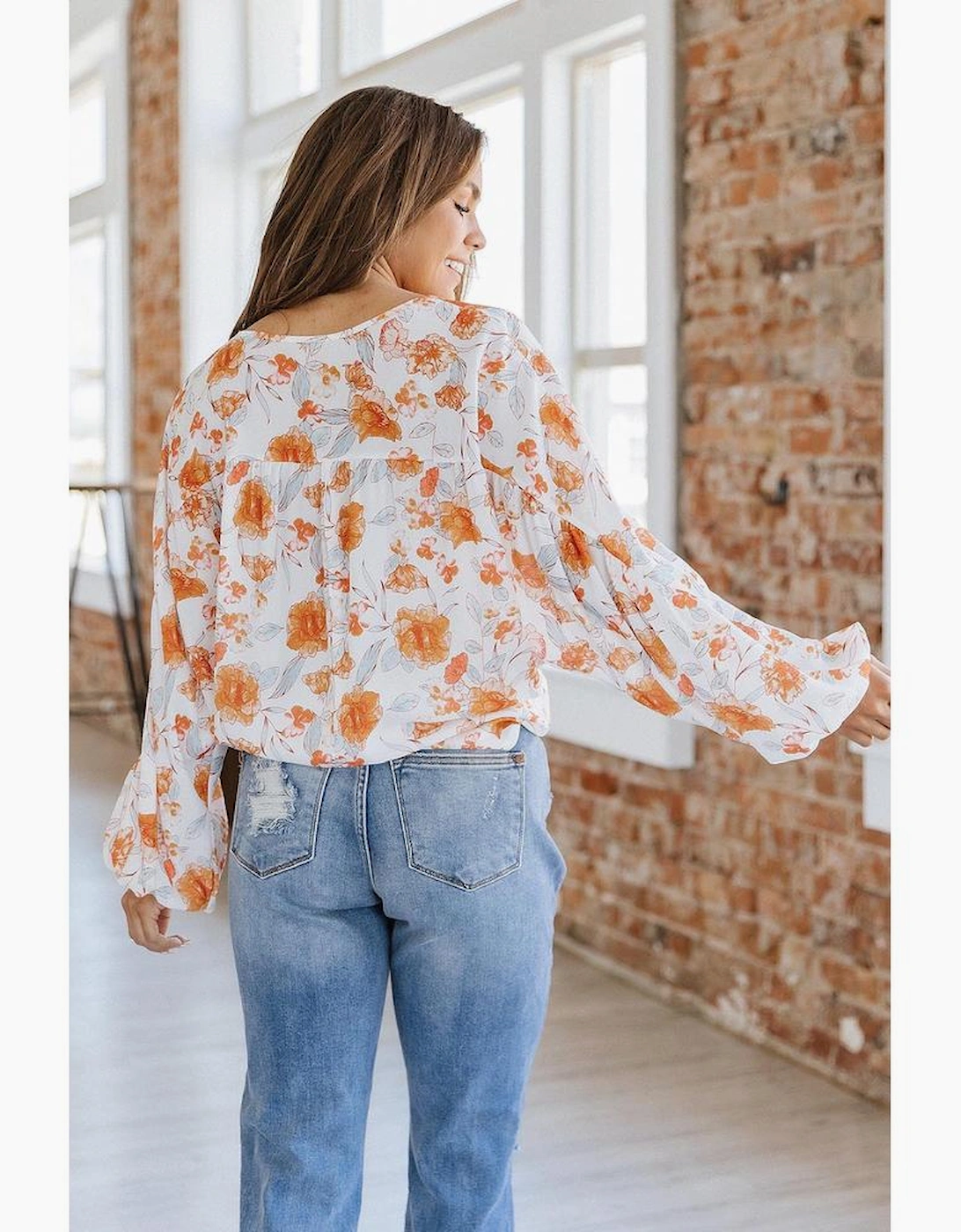White Tassel Tie V Neck Bubble Sleeve Floral Blouse