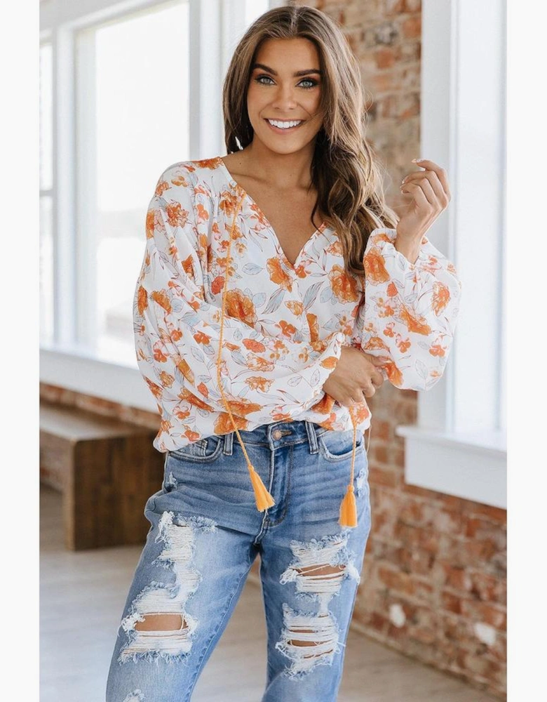 White Tassel Tie V Neck Bubble Sleeve Floral Blouse