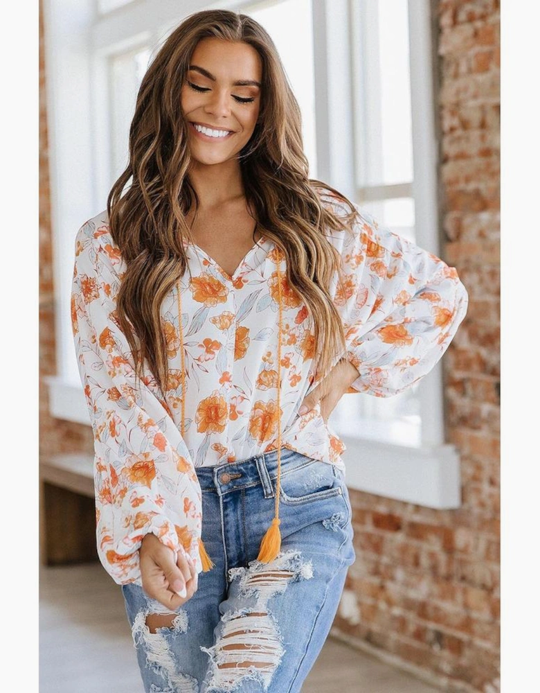 White Tassel Tie V Neck Bubble Sleeve Floral Blouse