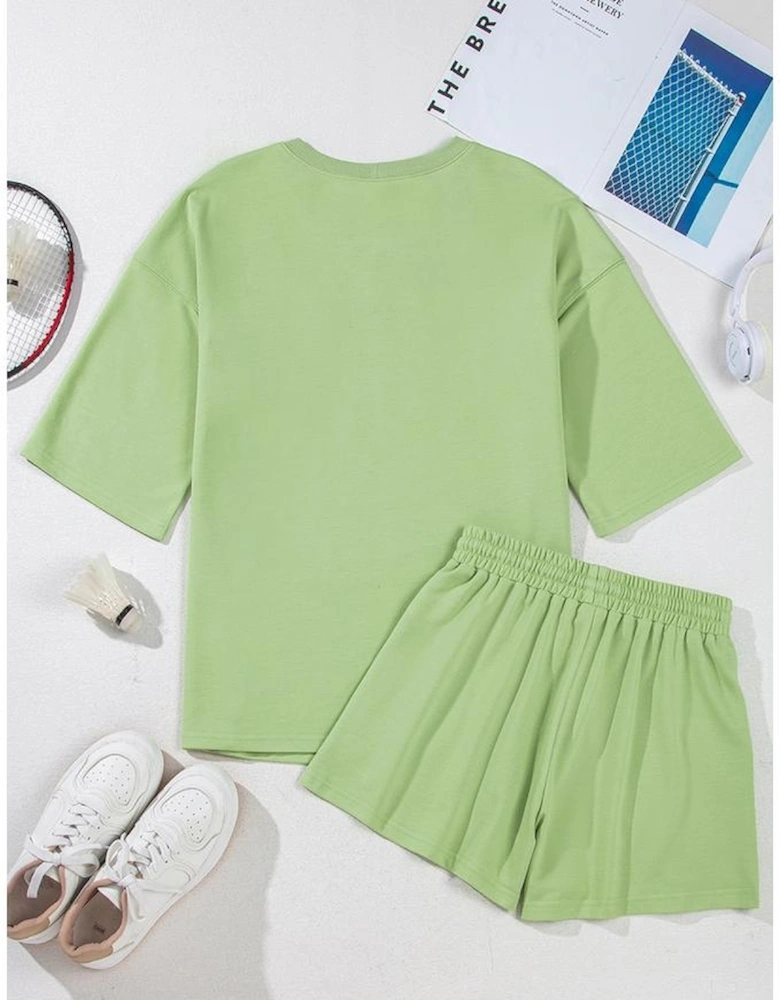 Meadow Mist Green Plus Size V Neck Drop Shoulder Tee Loose Shorts 2pcs Outfit