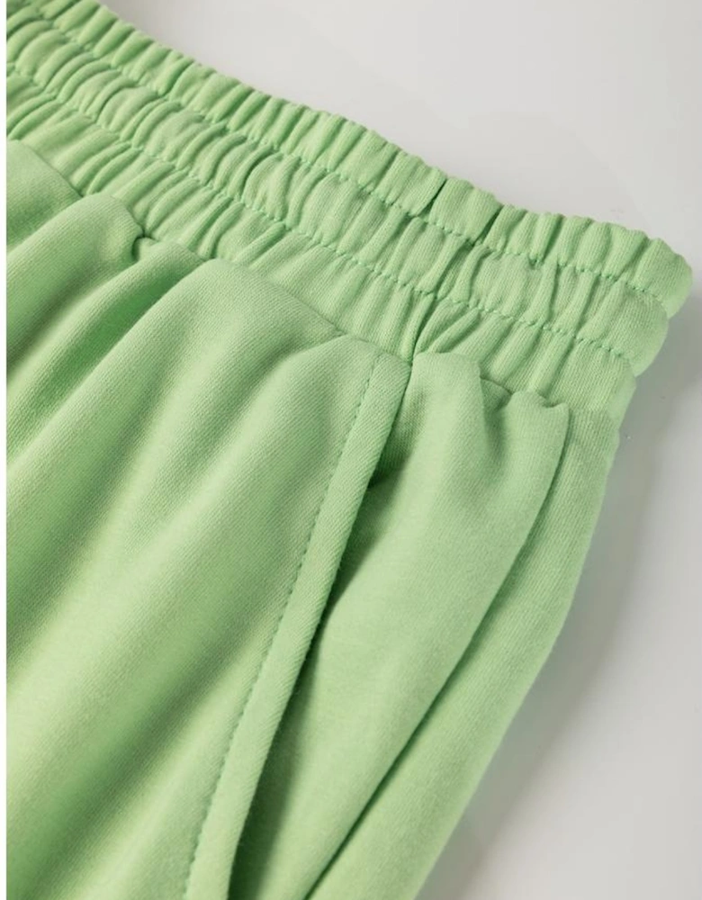 Meadow Mist Green Plus Size V Neck Drop Shoulder Tee Loose Shorts 2pcs Outfit