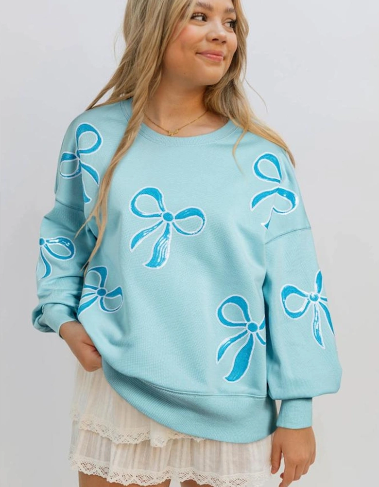 Beau Blue Sequined Bowknot Drop Shoulder Oversized Sweatshirt