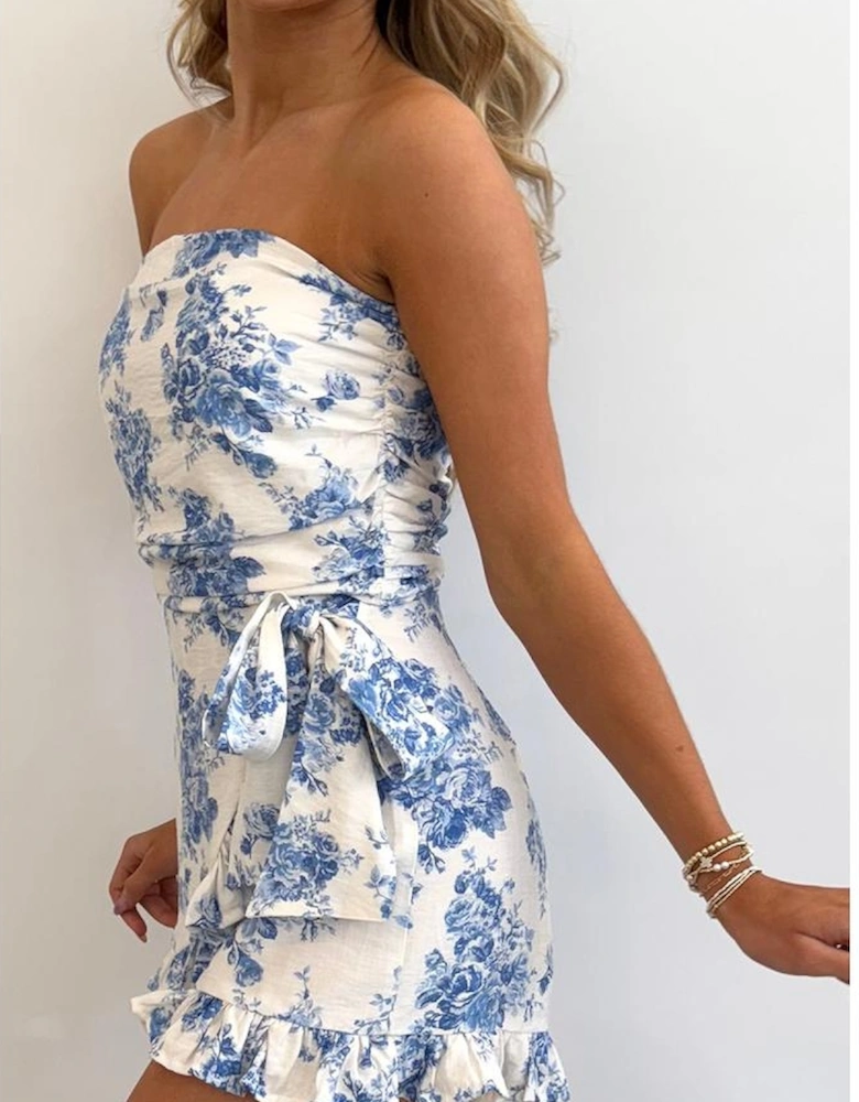 Sky Blue Floral Print Strapless Zipped Back Knot Waist Ruffled Romper