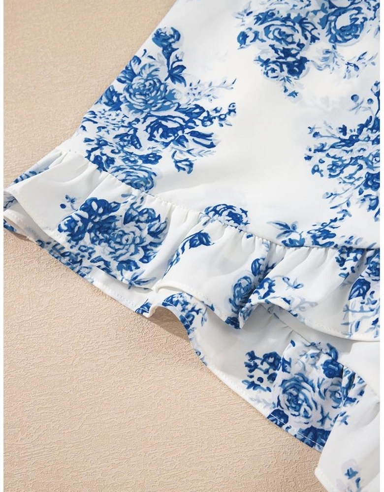 Sky Blue Floral Print Strapless Zipped Back Knot Waist Ruffled Romper