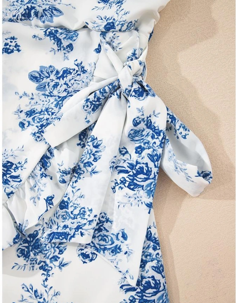 Sky Blue Floral Print Strapless Zipped Back Knot Waist Ruffled Romper
