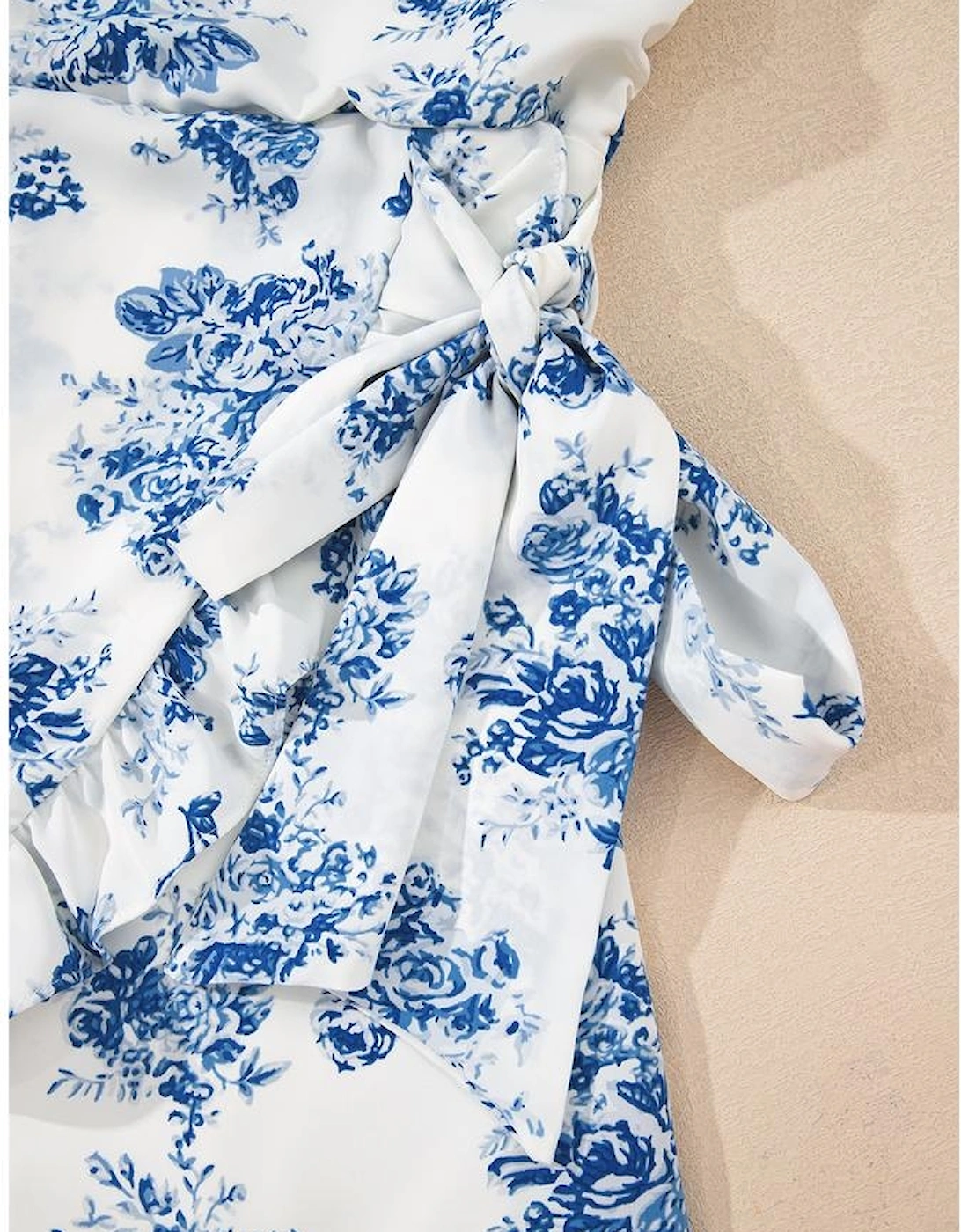 Sky Blue Floral Print Strapless Zipped Back Knot Waist Ruffled Romper