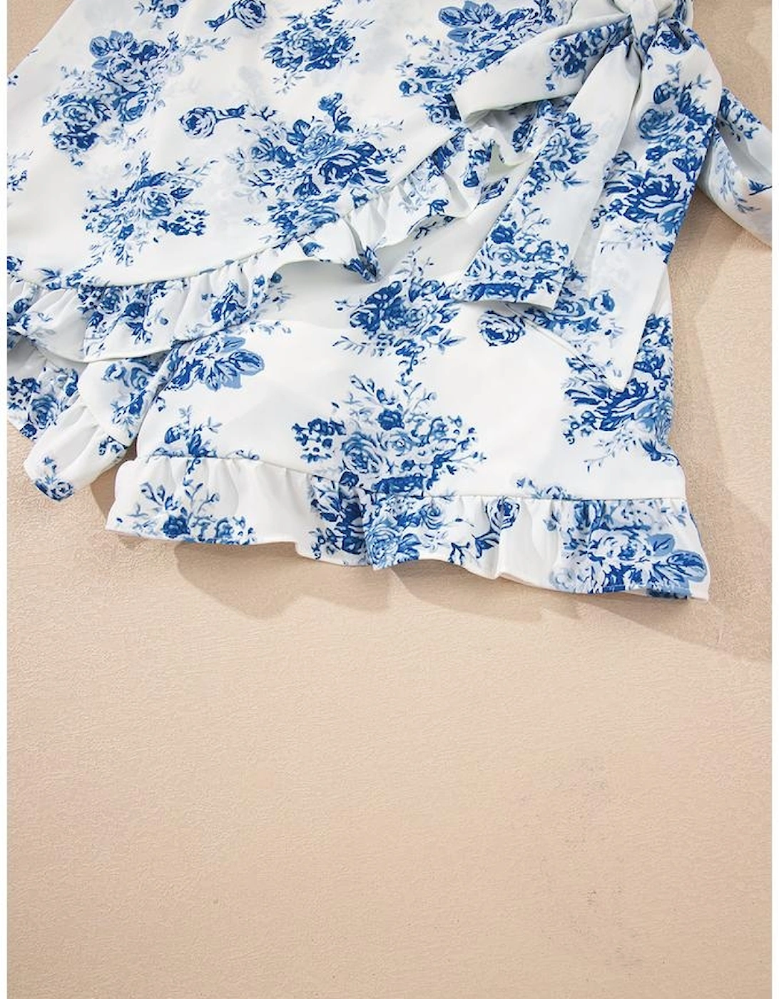 Sky Blue Floral Print Strapless Zipped Back Knot Waist Ruffled Romper