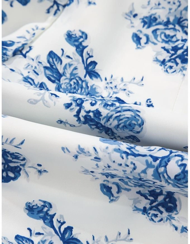 Sky Blue Floral Print Strapless Zipped Back Knot Waist Ruffled Romper