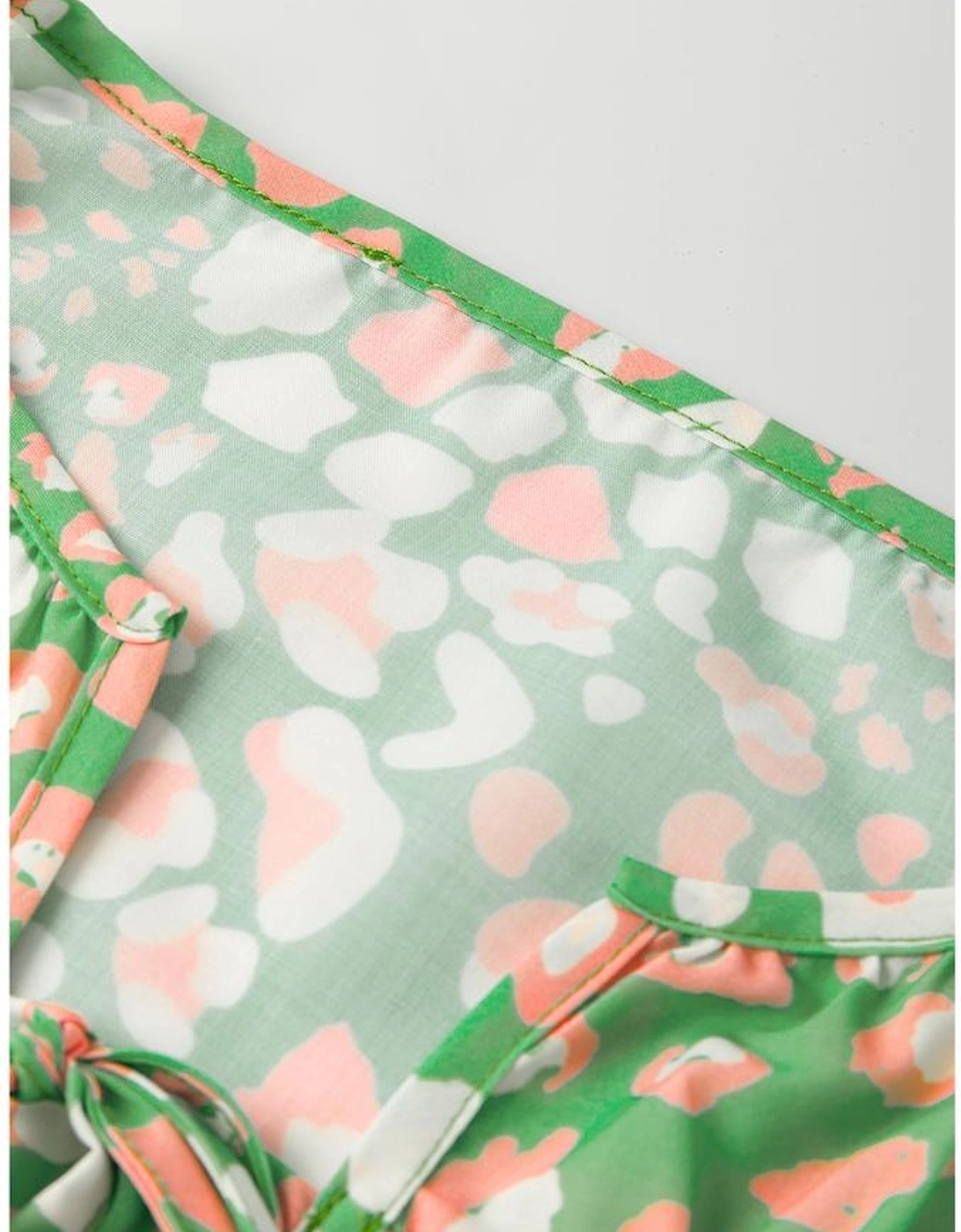 Green Abstract Leopard Tied Front Flutter Sleeve Blouse