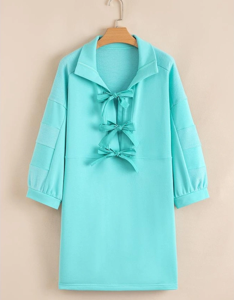Moonlight Jade Bow Front Bracelet Sleeve Collared Side Pocket Shift Mini Dress