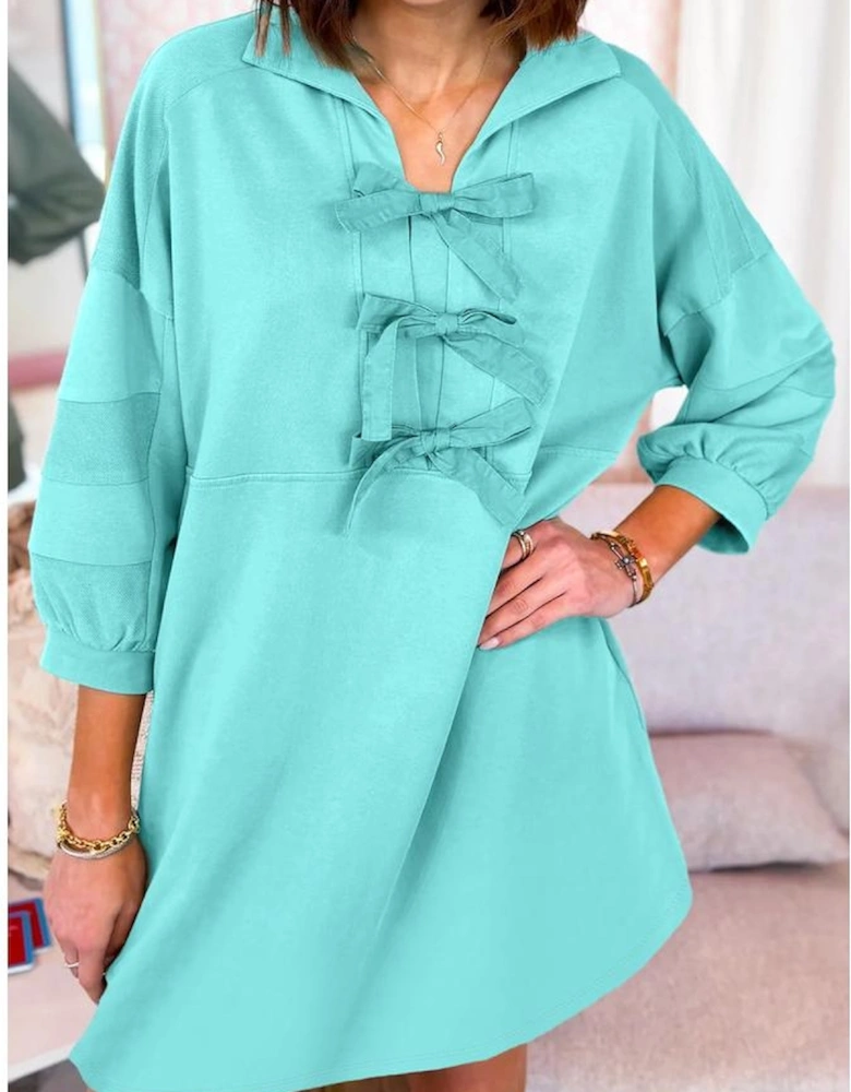 Moonlight Jade Bow Front Bracelet Sleeve Collared Side Pocket Shift Mini Dress