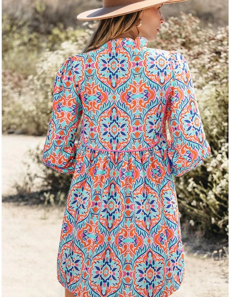 Sky Blue Abstract Printed Long Sleeve Tied Neckline Mini Dress