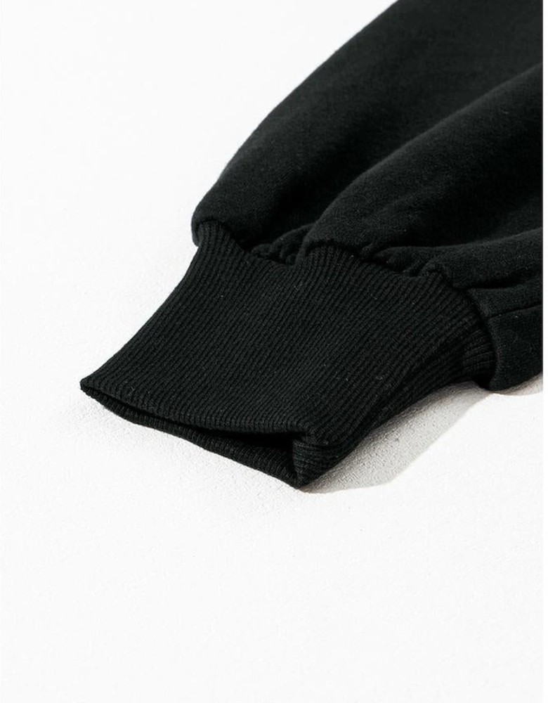 Black Solid Kangaroo Pocket Half Zipper Oversized Hoodie