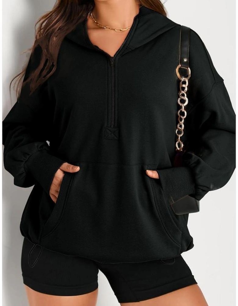 Black Solid Kangaroo Pocket Half Zipper Oversized Hoodie