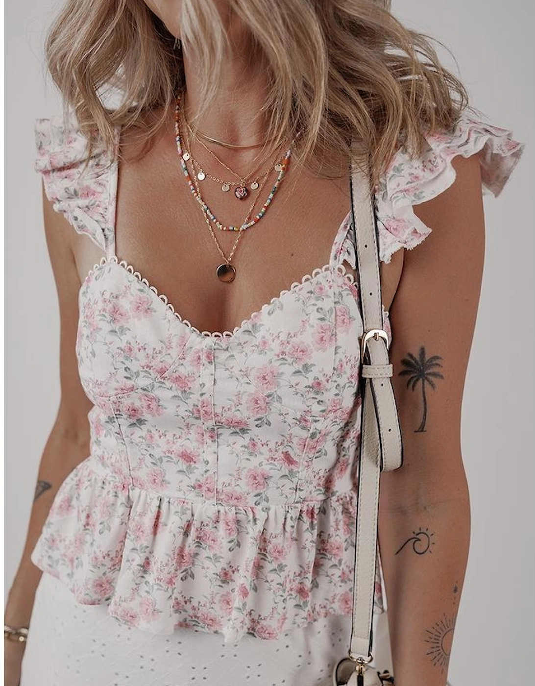 Pink Floral Flutter Peplum Tank Top