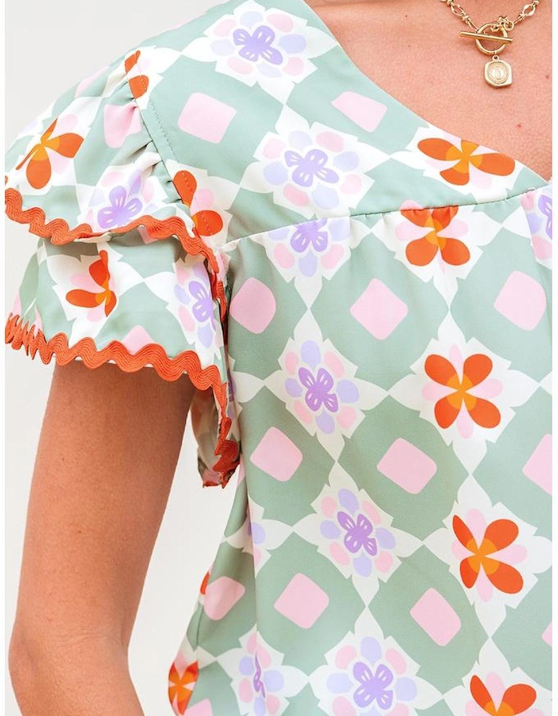 Green Geometric Floral Print Layered Flutter Sleeve V Neck Ric Rac Trim Blouse