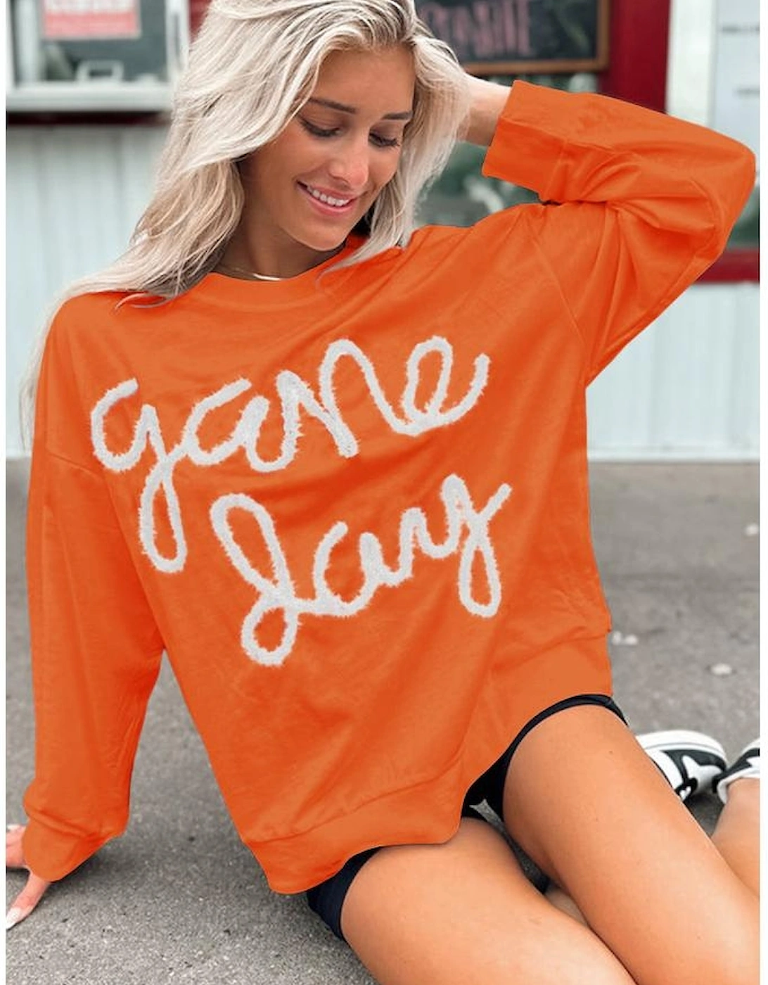 Russet Orange Tinsel Game Day Drop Shoulder Graphic Sweatshirt