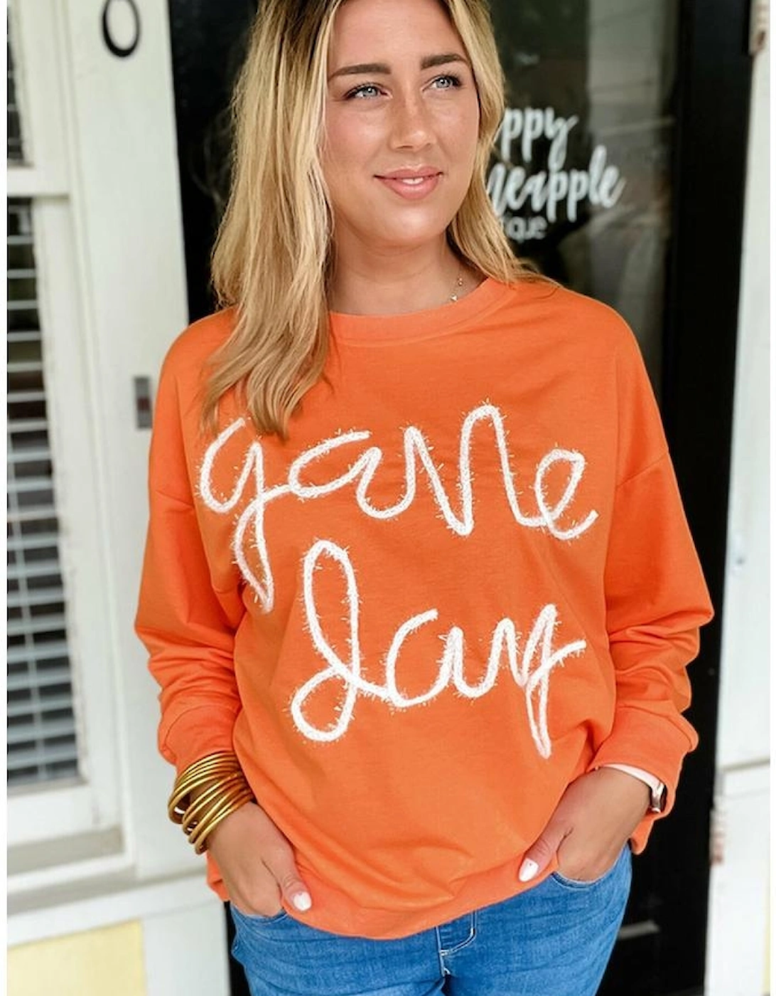 Russet Orange Tinsel Game Day Drop Shoulder Graphic Sweatshirt