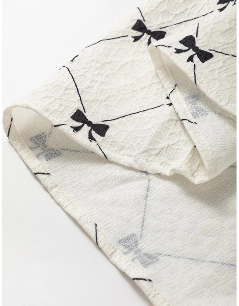 White Bowtie Pattern Textured Puff Half Sleeve Loose Mini Dress