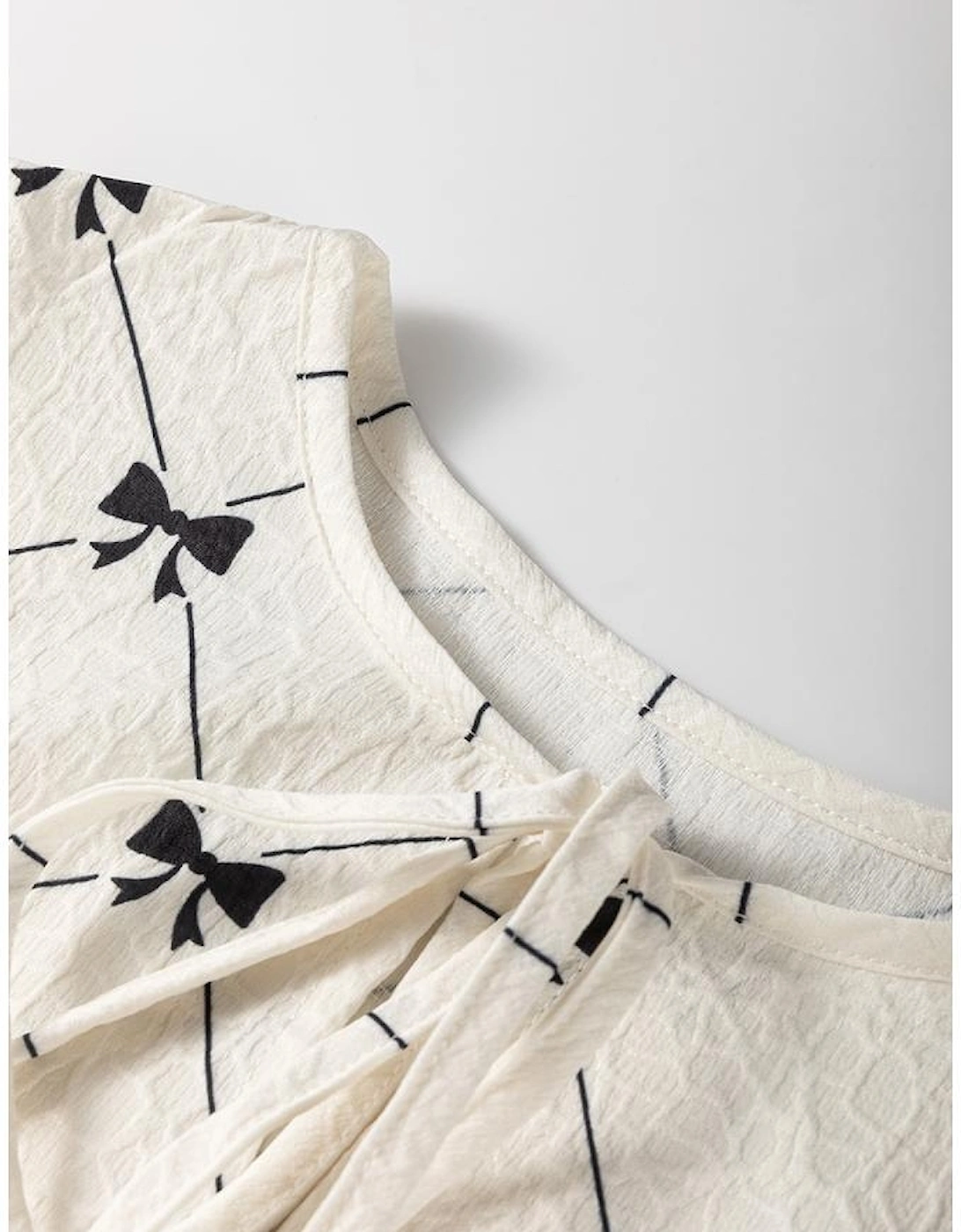 White Bowtie Pattern Textured Puff Half Sleeve Loose Mini Dress