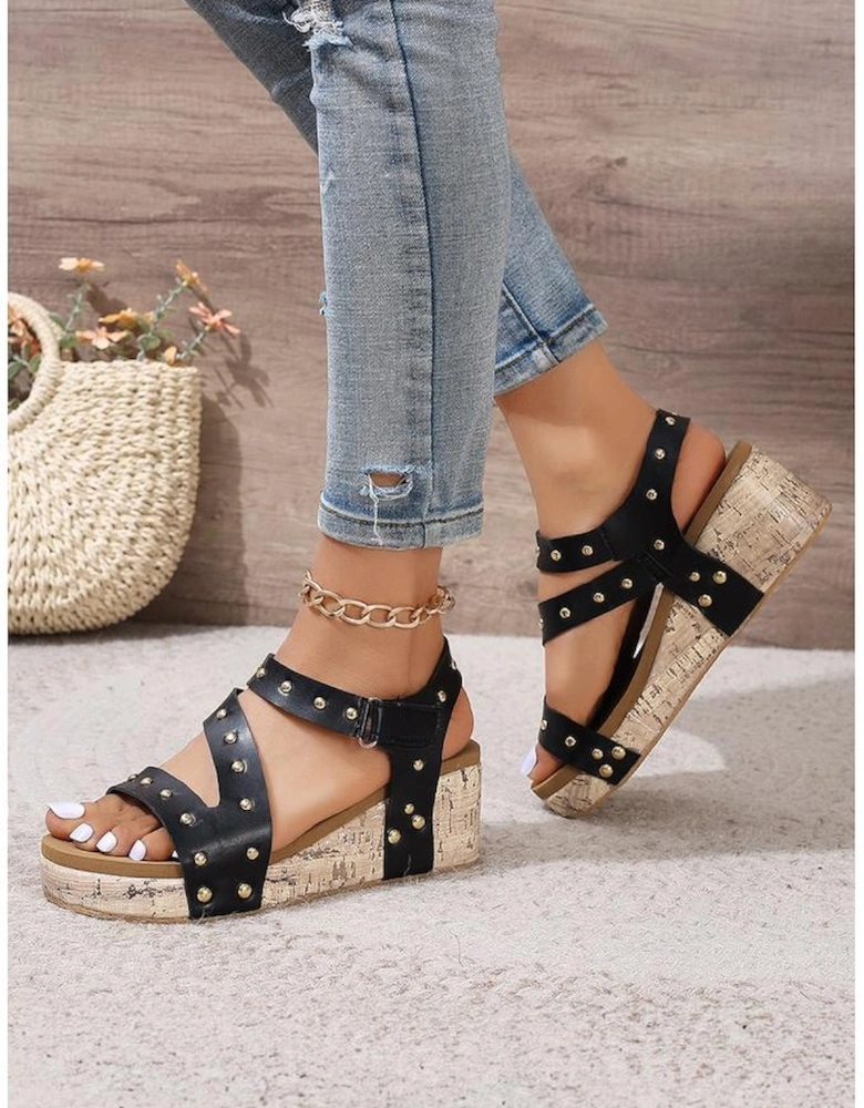 Black Rivet Hollow Out Leather Wedge Sandals