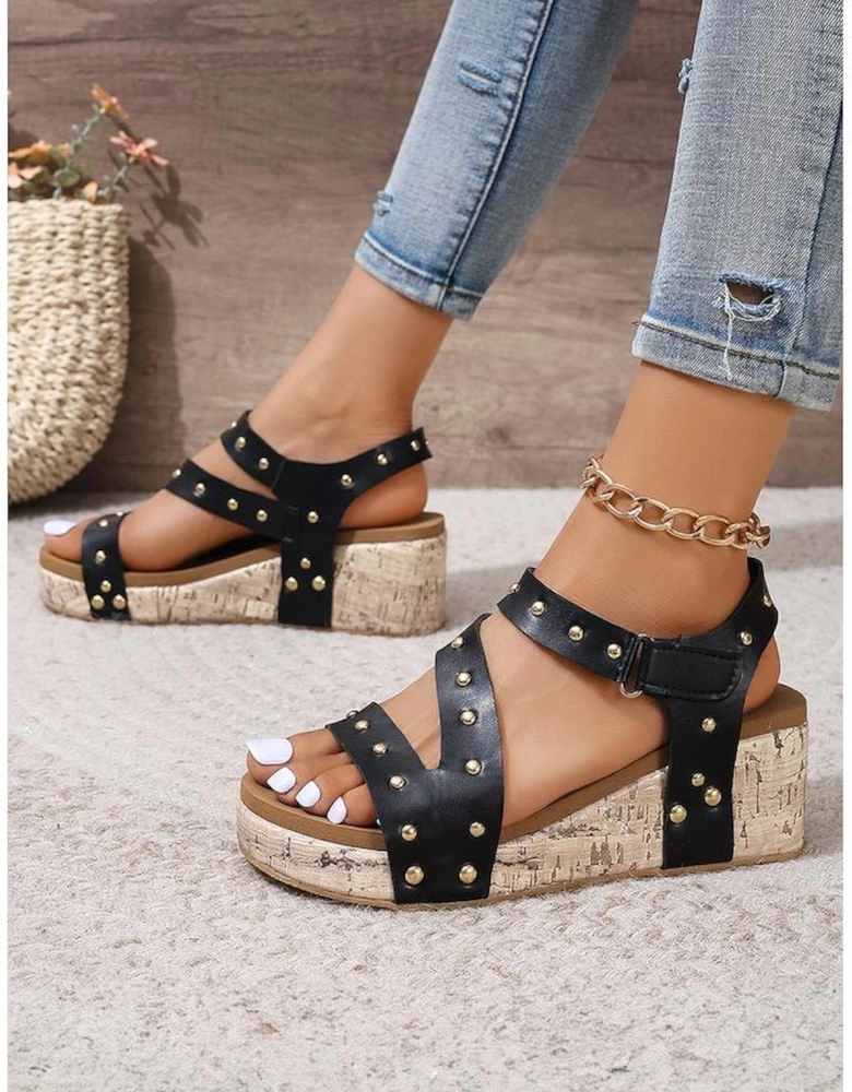 Black Rivet Hollow Out Leather Wedge Sandals