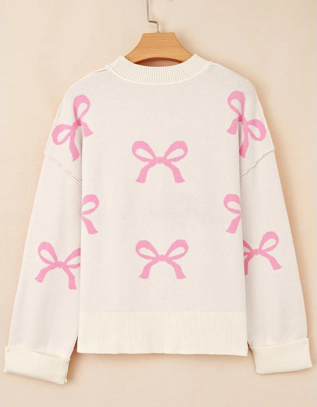 Pink Bow Print Ribbed Trim Exposed Seam Drop Shoulder Loose Sweater