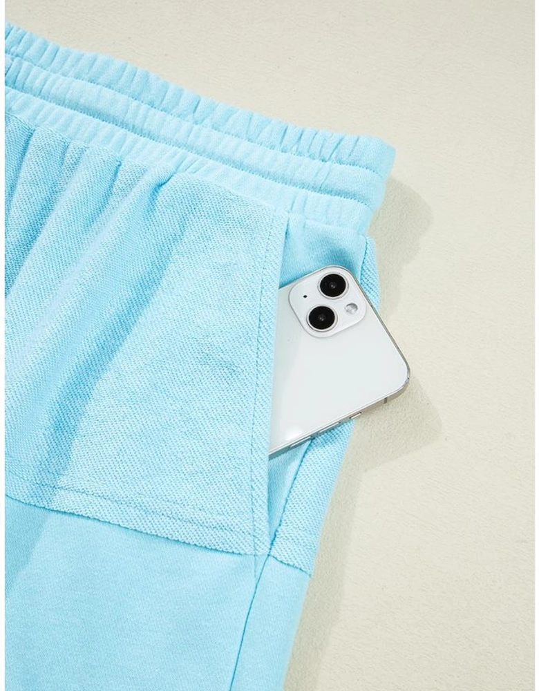 Aruba Blue Plus Size Solid Color Splicing Raw Hem Pullover Top Shorts Set