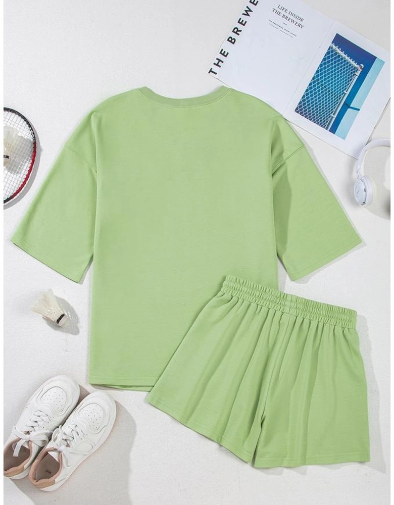Meadow Mist Green Solid Loose V Neck Half Sleeve Tee and Shorts