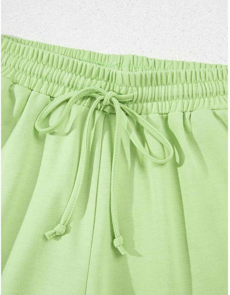 Meadow Mist Green Solid Loose V Neck Half Sleeve Tee and Shorts