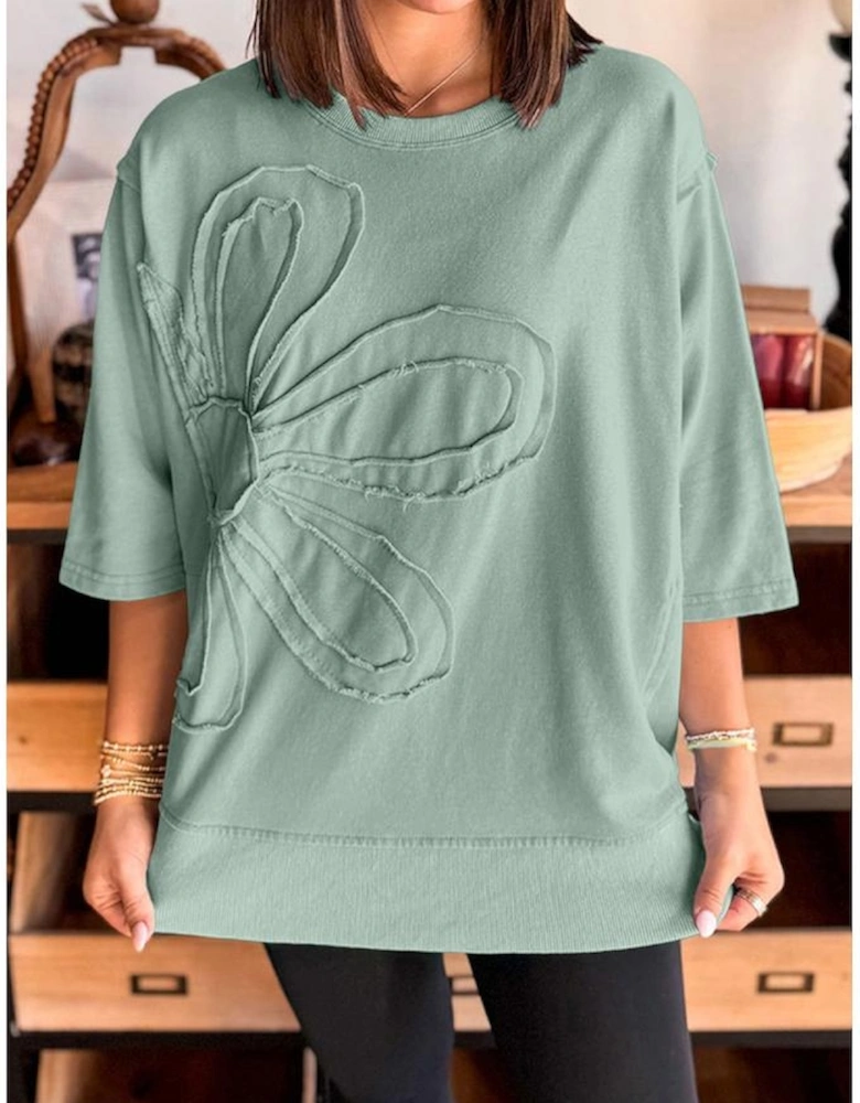 Clearly Aqua Floral Patched Half Sleeve Tunic Top