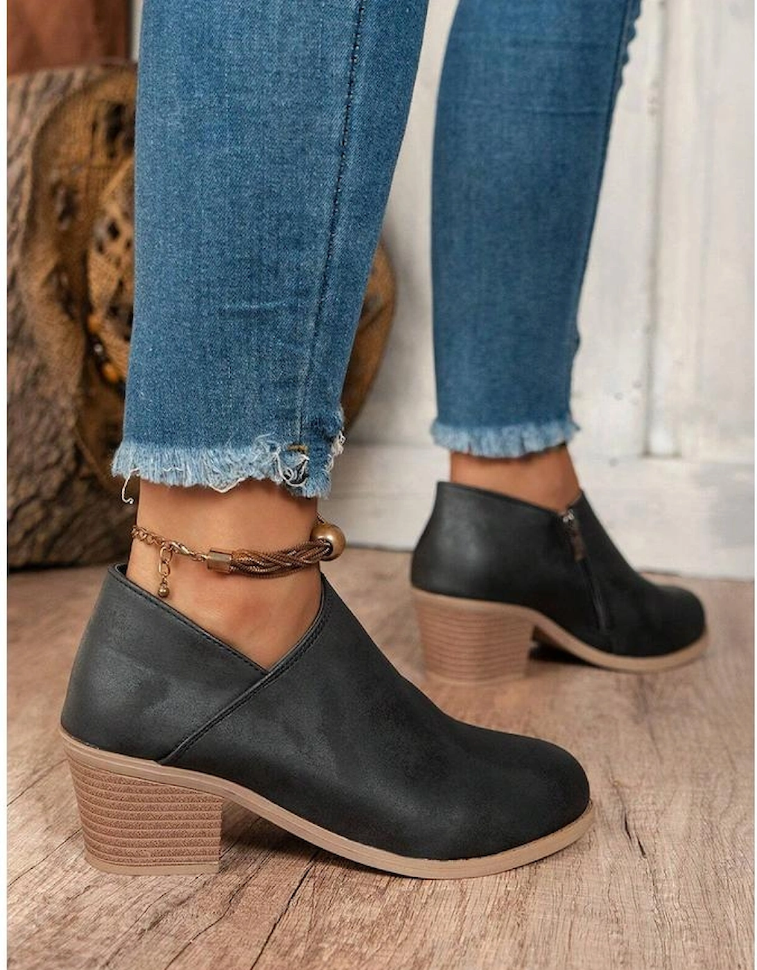 Black Tulip Opening Suede Ankle Boots