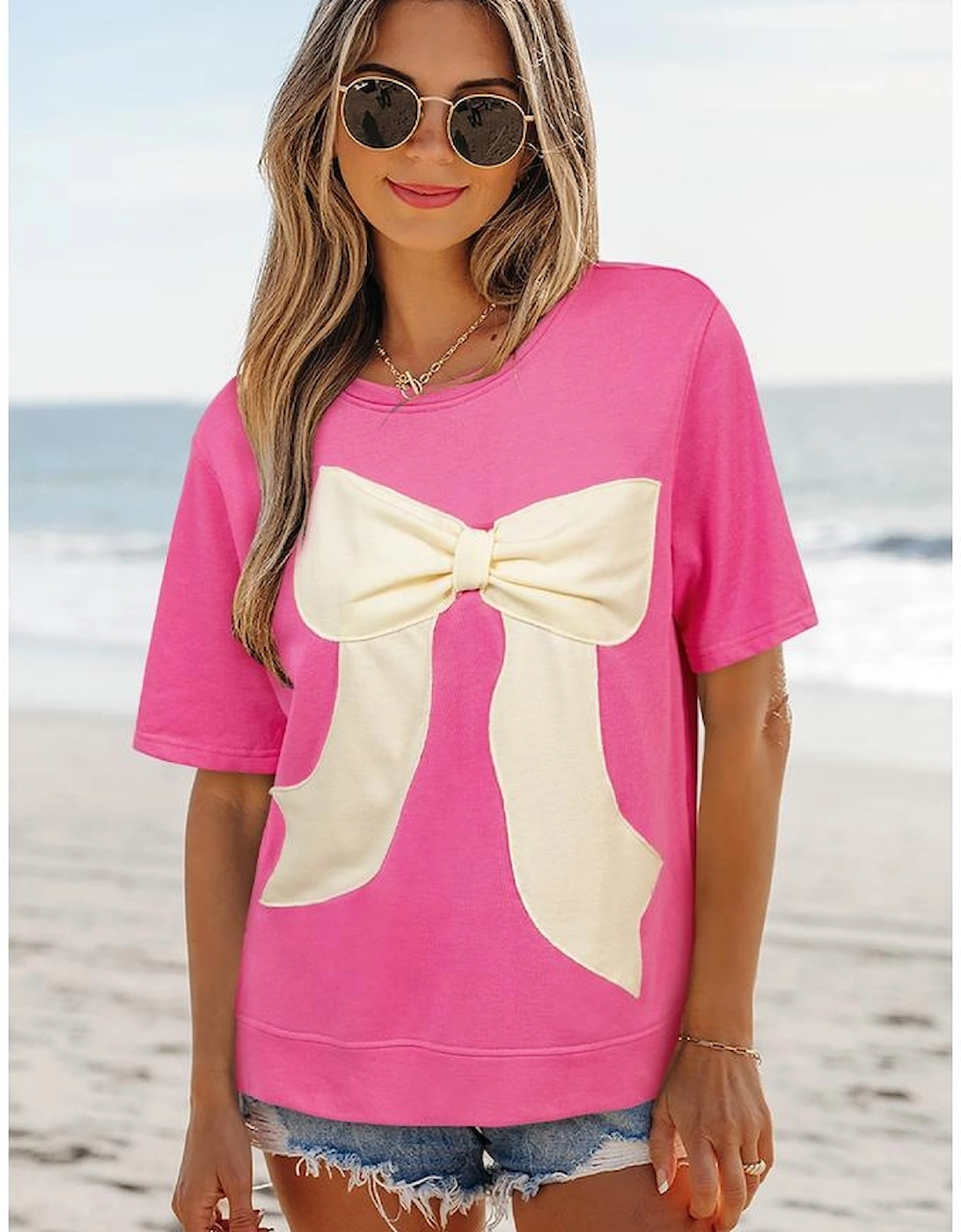 Strawberry Pink Contrasting Color Ribbon Bow Front Patch Loose Tee with Slits