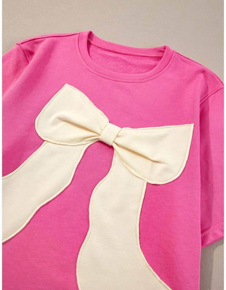 Strawberry Pink Contrasting Color Ribbon Bow Front Patch Loose Tee with Slits