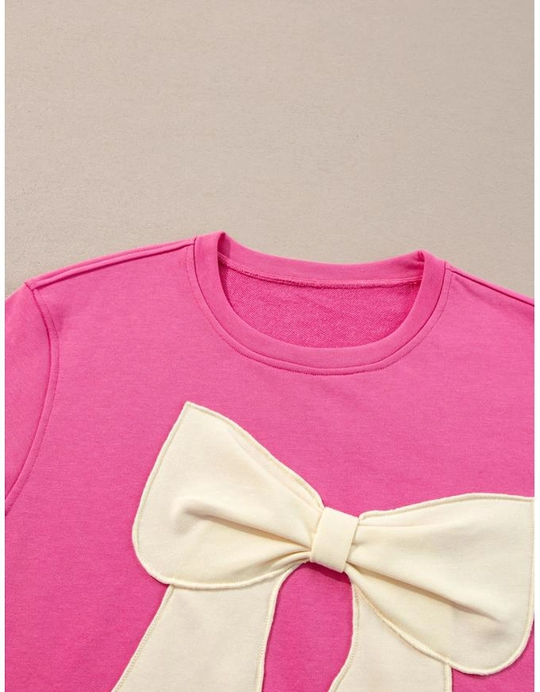 Strawberry Pink Contrasting Color Ribbon Bow Front Patch Loose Tee with Slits
