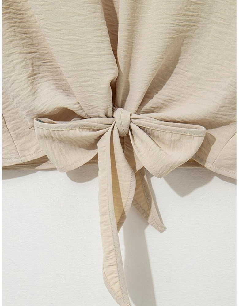 Parchment Solid Color Knotted Hem Short Sleeve Blouse