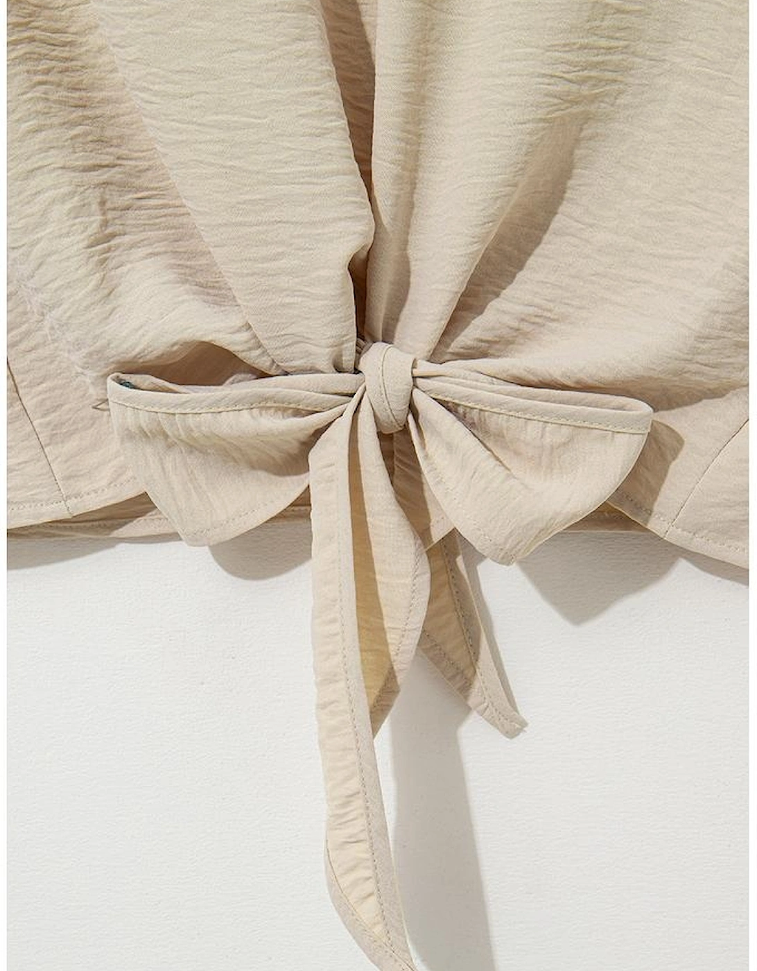 Parchment Solid Color Knotted Hem Short Sleeve Blouse